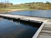  One of the walkways across a lake to the Visitor Village